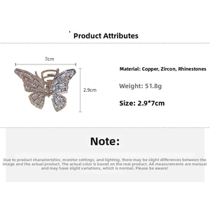 Detailed view of butterfly hair claw with silver metal, zircon stones, and dimensions