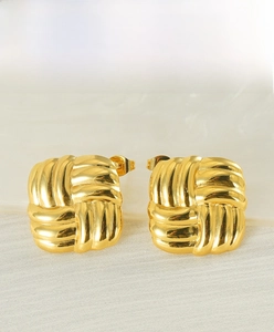 Detailed close-up of 18K gold-plated square stud earrings featuring a woven rope texture