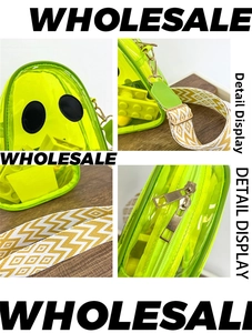 Detail view of neon yellow transparent PVC jelly bag with woven strap and ghost patterns