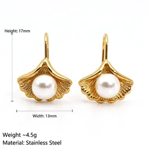 Elegant 316 stainless steel ginkgo leaf earrings with white pearls in gold finish