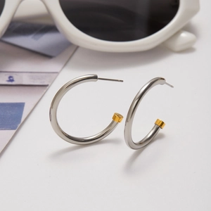 Modern minimalist C-shaped two-tone earrings in silver and 18K gold stainless steel