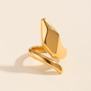 Close-up of 18K gold plated snake-shaped irregular ring with sculpted metallic texture