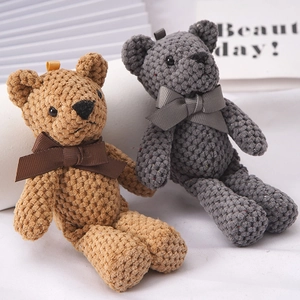Knitted teddy bear plush keychain with ribbon bows for bags in light brown and dark grey