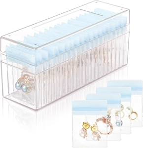 Macro view of clear acrylic jewelry box and thick blue anti-oxidation storage bags