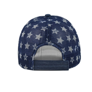 Detail of navy cotton trucker hat featuring white star print and adjustable back strap