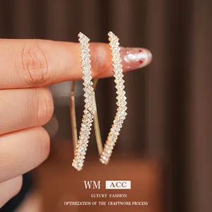 Luxury gold geometric hexagon hoop earrings with sparkling white zircons for women