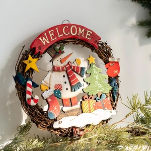 Vintage Christmas wreath with snowman and wooden welcome sign for front door decor