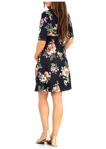Detailed back view of a dark floral maternity dress with colorful summer flower patterns