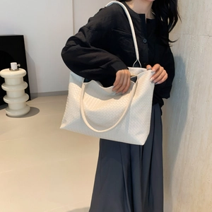 Lazy style large capacity cream woven tote bag for women shown as a stylish crossbody bag