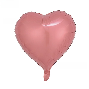 Close-up of 18-inch heart-shaped foil balloon in pearlescent pink with metallic finish
