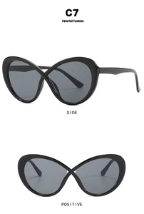 Detail of butterfly-shaped glasses frame with unique cross-bridge design and side view