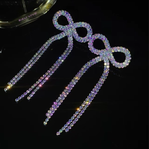 Sparkling AB rhinestone bow earrings with long tassels in a polished silver finish