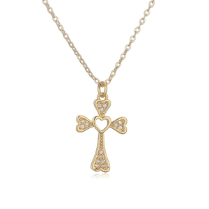 Detail of 18K gold plated cross pendant with heart motifs and inlaid white zircon stones