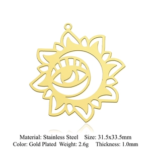 Detail of gold-plated stainless steel sun and eye pendant with product measurements