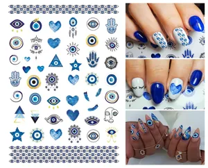 Detail of blue evil eye nail stickers set including Fatima hand and heart designs