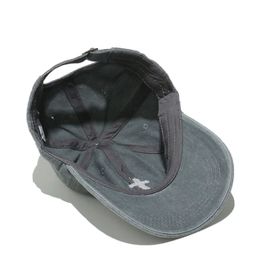 Internal structure of gray washed cotton baseball cap with sweatband and adjustable buckle