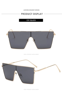 Front and side view of oversized square black sunglasses with luxury gold metal frame