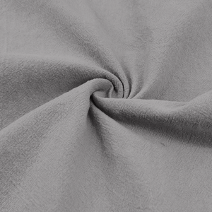 Macro shot of breathable gray linen-cotton fabric texture with weave detail