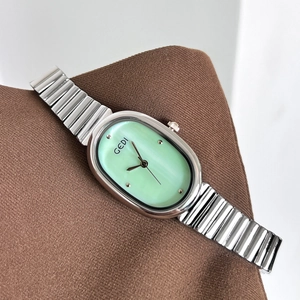 Elegant oval mint green dial watch with silver stainless steel strap for professional women