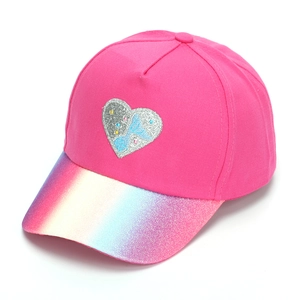 Detailed side view of pink girls baseball cap with heart patch and glitter sequin brim