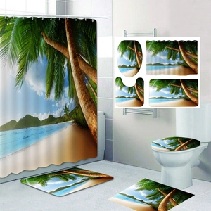 Detail view of tropical beach print shower curtain and matching four-piece bathroom rug set