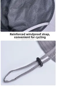 Detail of grey outdoor sun hat featuring breathable mesh lining and adjustable windproof cord