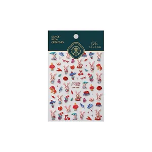 3D embossed cartoon bunny nail stickers with pink rabbits and sweets motifs