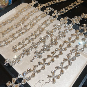 Elegant silver flower crystal bracelets set displayed neatly on a premium jewelry tray