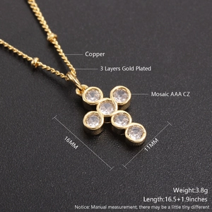 Macro shot of 16x11mm cross pendant necklace with AAA cubic zirconia in gold plating