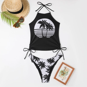 Detail view of two-piece bikini with coconut tree print and drawstring side tie detail