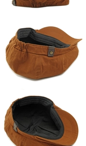 Detail view of caramel newsboy cap with elastic back and retro metal buckle fastener