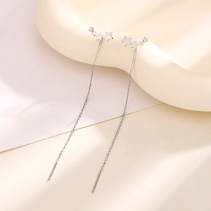 Elegant silver tassel earrings featuring sparkling gradient stars and zircon dangles