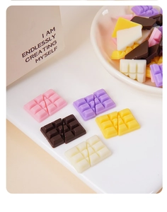 Macro view of colorful mini resin chocolates for DIY crafts and phone case decoration