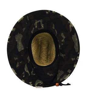 Close-up of camouflage sun hat with natural straw interior and adjustable chin strap