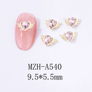 Pink heart nail charm with golden wings and water drop gem measuring 9.5x5.5mm