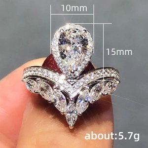 Luxurious pear cut crown ring with teardrop cubic zirconia and V-shaped diamond band