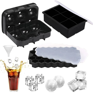 Three-piece black silicone ice cube molds set with spheres, large cubes, and honeycombs