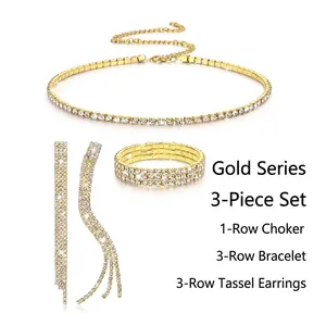 Detailed view of golden rhinestone jewelry set with necklace, bracelet and earrings