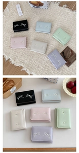 Short foldable PU leather wallet for women with bow print and pearl rivet detail
