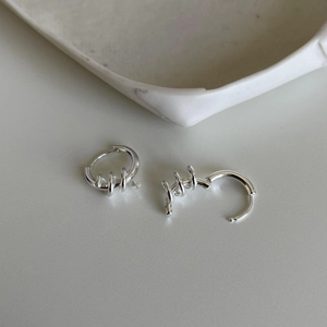 Minimalist 925 sterling silver hoop earrings with a unique twisted spiral design and buckle