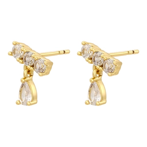 Detailed close-up of 18K gold plated earrings featuring sparkling teardrop zircon tassels