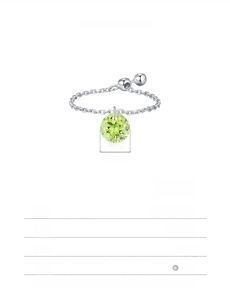 Macro detail of S925 sterling silver chain ring with 6mm olive green gem pendant