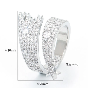 Irregular twisted open ring with star motif and shimmering cubic zirconia stones