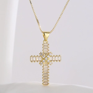 Minimalist gold plated cross pendant necklace with sparkling cubic zirconia on box chain