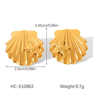 Detailed view of 18k gold starfish shell earrings with dimensions 2.45cm by 2.5cm