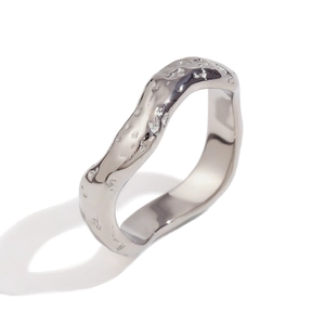 Minimalist silver wavy hammered ring made of polished stainless steel for women