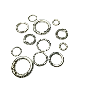 Vintage Tibetan silver rings and carved metal spacers for Buddhist bracelet accessories