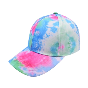 Detail view of colorful tie-dye baseball cap with pink and blue vibrant patterns