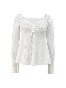Elegant white lace long sleeve top with V-neck tie detail and delicate embroidery
