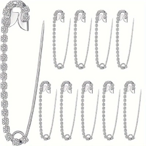 Détail de l'ensemble de 9 pinces de taille argentées avec strass et épingles de sûreté métal